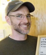photo of Lincoln Best with bees